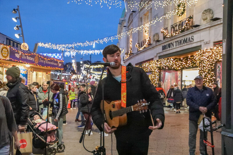 Kelvin Long performs during the annual busking marathon to raise funds for Penny Dinners on Patrick Street, Cork. Picture: David Creedon