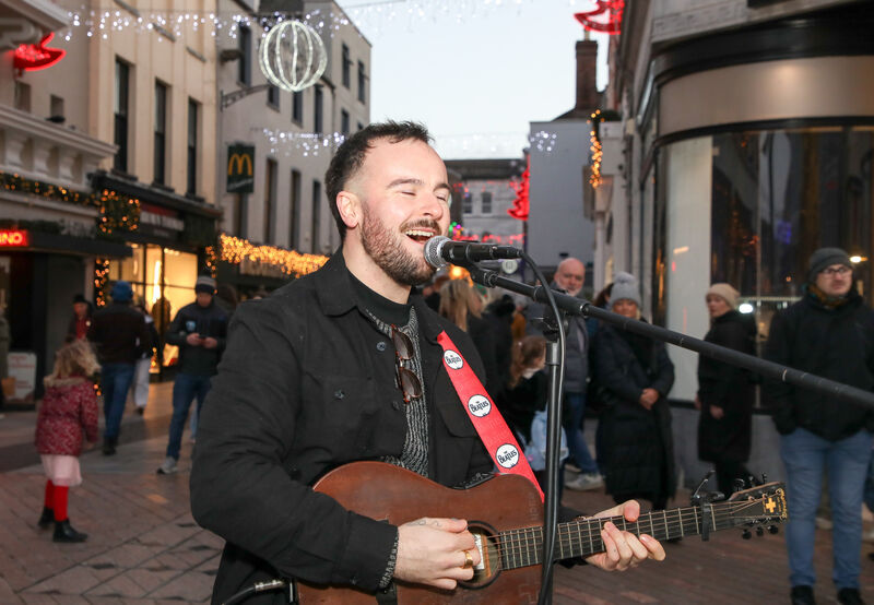 Aaron O'Sullivan performs during the annual busking marathon to raise funds for Penny Dinners on Patrick Street, Cork. -Picture: David Creedon