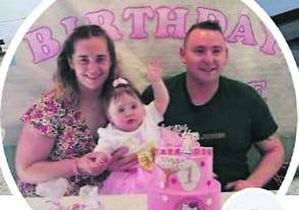 John Drislane with his partner Helen and their daughter Eva Rose