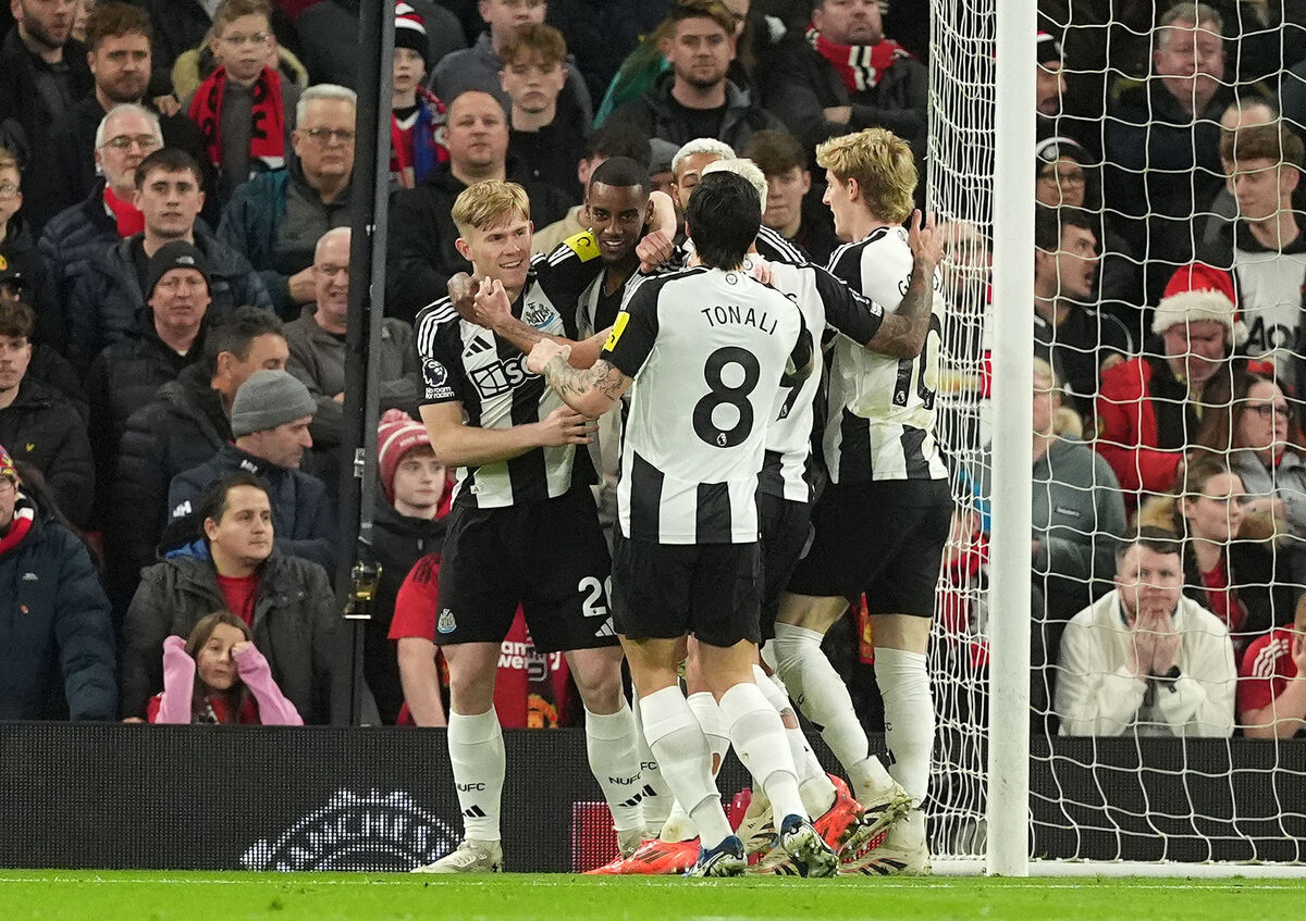 Newcastle United's Alexander Isak (second left) celebrates with teammates after scoring his side's first goal of the game during the Premier League match at Old Trafford, Manchester. Picture: Martin Rickett/PA Wire