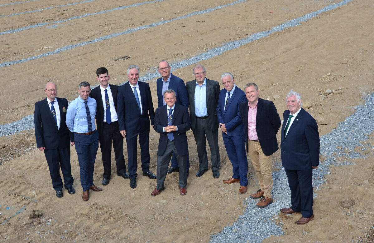 Pictured on the site of the new astro pitch at Ballea Park in Carrigaline were Michael O'Regan, secretary Carrigaline Utd AFC; Walter Halleran, FAI; Tim Mawe, Treasurer Carrigaline Utd FC; John Delaney, CEO FAI; Willie Walsh, Club Chairman; Minister Simon Coveney TD; Barry Duggan, Vice Chairman; Ken Dennehy, PRO; Michael McGrath TD and Tony Fitzgerald, President FAI. Picture: Howard Crowdy