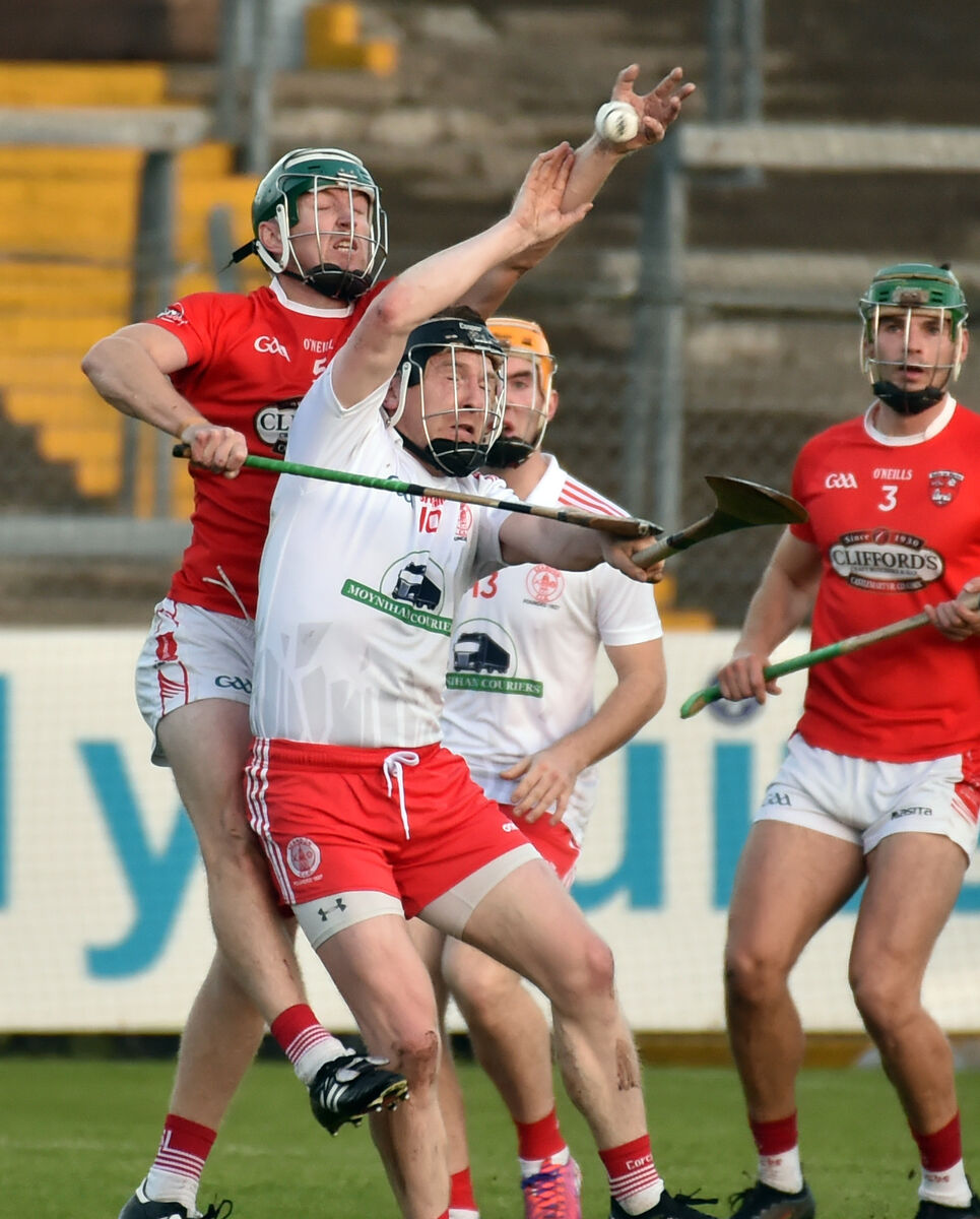 Imokilly's Ciaran O'Brien reaches highest from Seandún's Nicky Kelly during the Co-Op Superstores Cork premier SHC divisions/colleges play off final at Pairc Ui Rinn. Picture: Eddie O'Hare Imokilly's Ciaran O'Brien reaches highest from Seandún's Nicky Kelly during the Co-Op Superstores Cork premier SHC divisions/colleges play off final at Pairc Ui Rinn. Picture: Eddie O'Hare