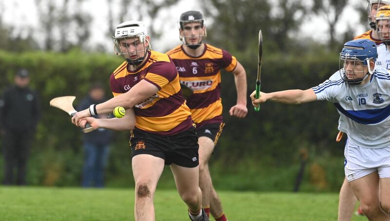 Cathal O'Sullivan makes a clearance for De La Salle as Lúcás Ó' Muirthile, Gaelcholáiste Mhuire AG gives chase. Picture: Larry Cummins Cathal O'Sullivan makes a clearance for De La Salle as Lúcás Ó' Muirthile, Gaelcholáiste Mhuire AG gives chase. Picture: Larry Cummins