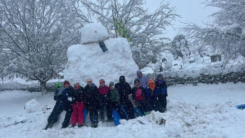 Children in North Cork village come together to build 12ft snowman