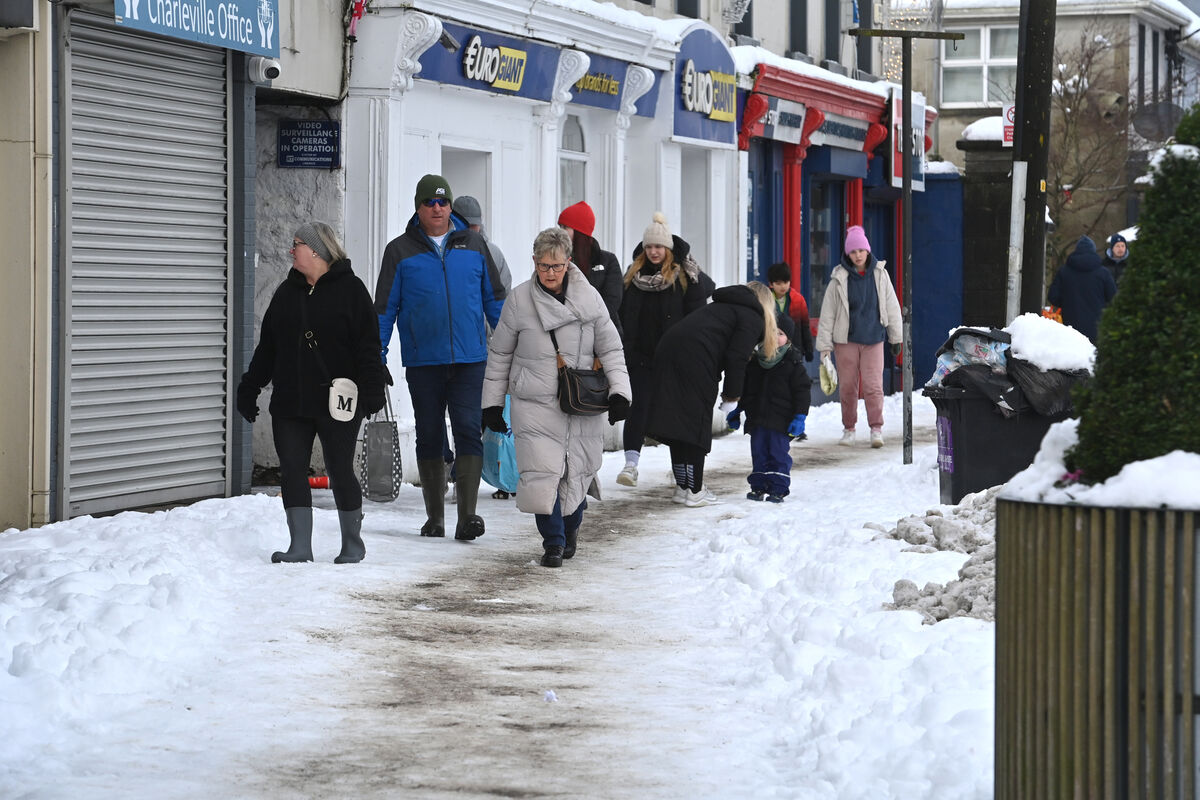 Shoppers make their way along the main street in Charleville, Co Cork. Picture: Dan Linehan Shoppers make their way along the main street in Charleville, Co Cork. Picture: Dan Linehan