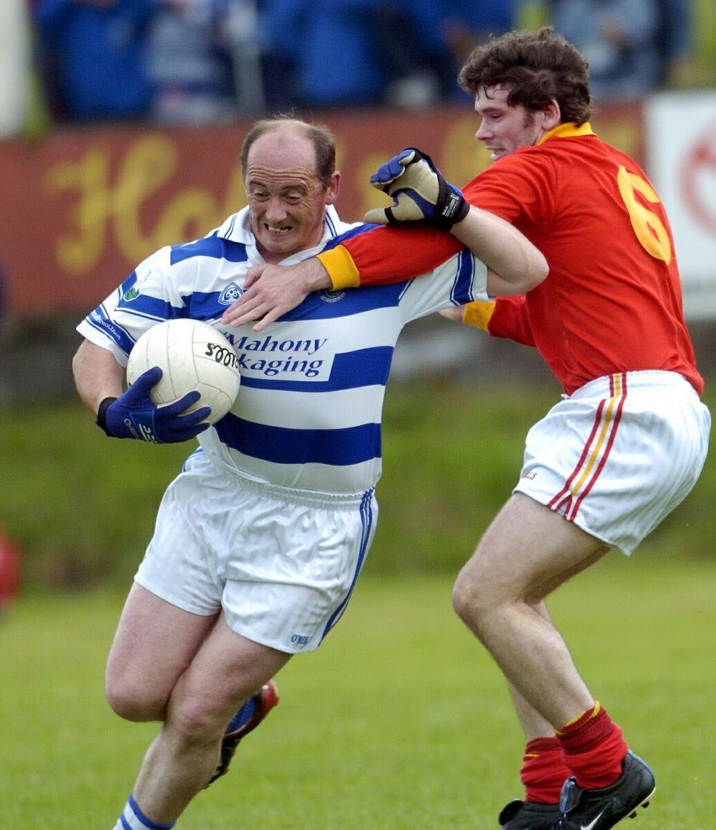 Castlehaven's Niall Cahalane tries to force his way past Mallow's Barry Doyle in 2004. Picture: Des Barry