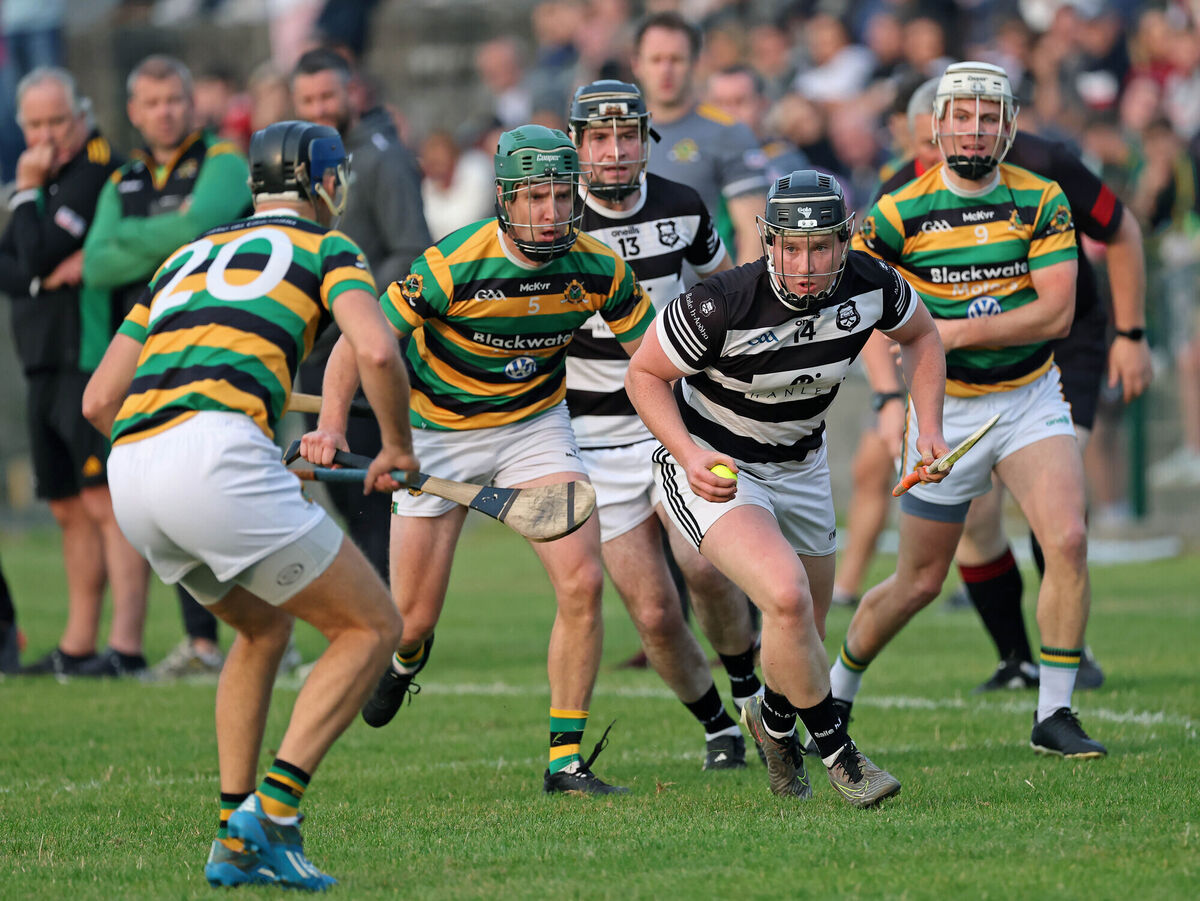 Ballyhea's Joseph Hickey looks for a way through the Glen Rovers defence. Picture: Jim Coughlan
