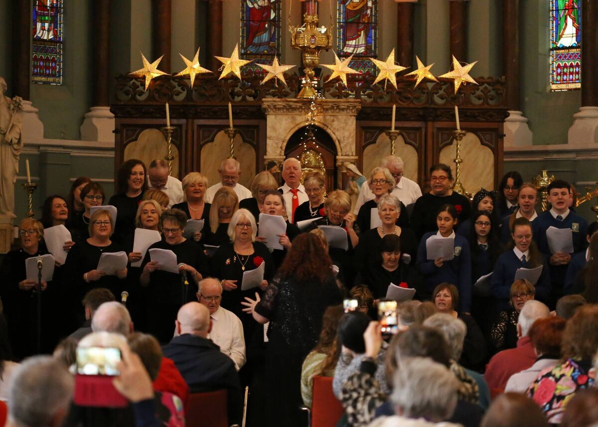 Cór Na Laoí Choir and Coláiste Éamann Rís Choir in the Goldie Chapel, Nano Nagle Place.