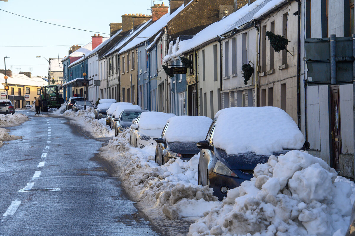 Cars stuck in the snow on New Street in Newmarket, Co Cork. Road users have again been asked to avoid unnecessary journeys and to take extreme care if they must travel as widespread severe frost, ice and lying snow persists. Picture: Dan Linehan Cars stuck in the snow on New Street in Newmarket, Co Cork. Road users have again been asked to avoid unnecessary journeys and to take extreme care if they must travel as widespread severe frost, ice and lying snow persists. Picture: Dan Linehan