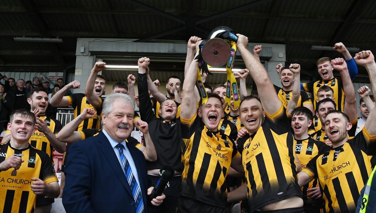 Russell Rovers joint captains Ciaran Sheehan and Eoghan O'Sulivan raise the cup after defeating Kilrossanty in the AIB Munster Club JHC final at Páirc Uí Rinn. Picture: Eddie O'Hare