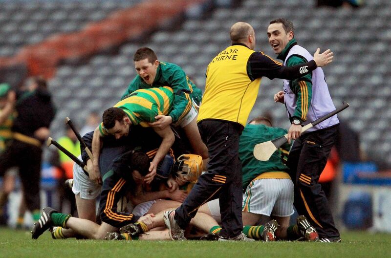 Ballymartle players and backroom members celebrate after their victory in 2011. Picture: Inpho/Donall Farmer