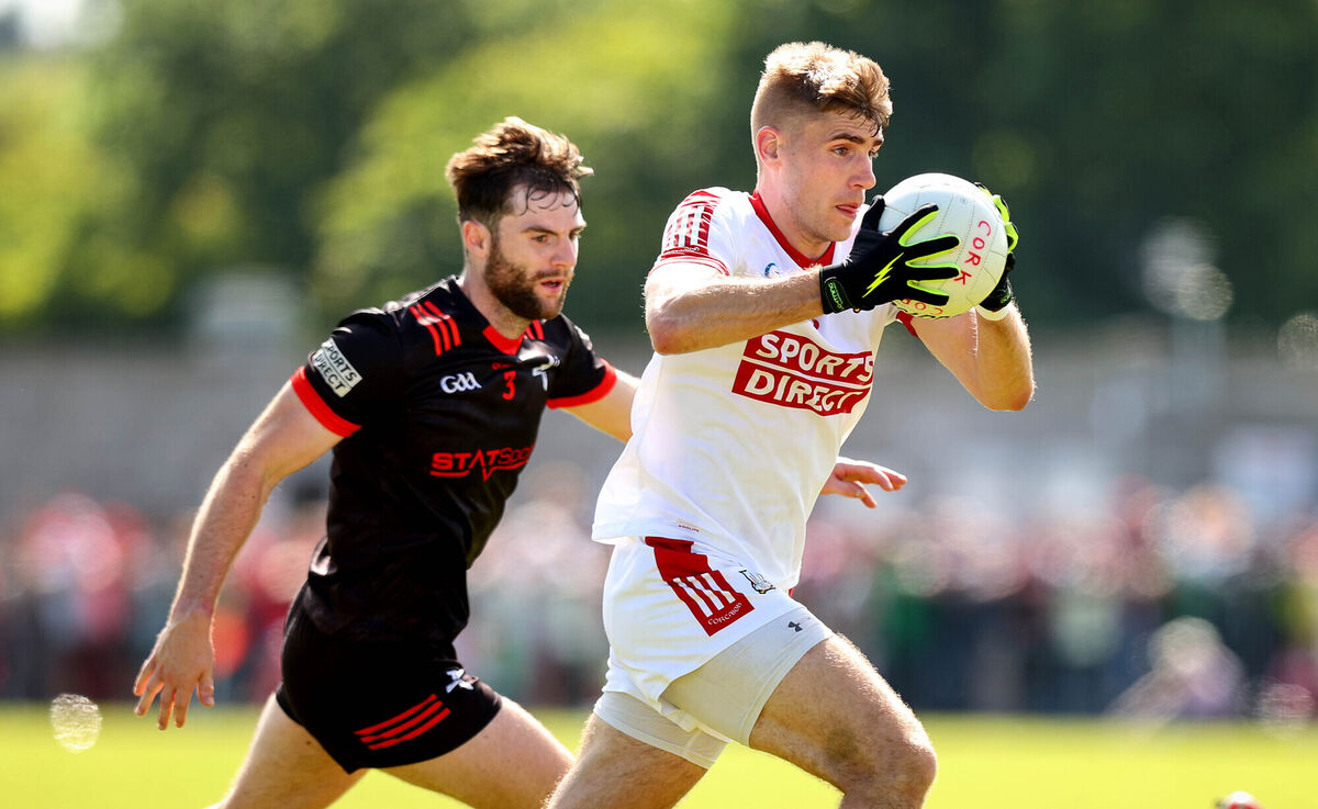 Louth’s Dermot Campbell tries to stop Ian Maguire of Cork last year. Picture: INPHO/Ryan Byrne Louth’s Dermot Campbell tries to stop Ian Maguire of Cork last year. Picture: INPHO/Ryan Byrne