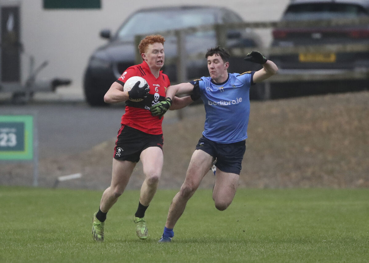 UCC's Diarmaid Phelan tries to move away from Barry McNulty of UCD. Picture: Patrick Browne