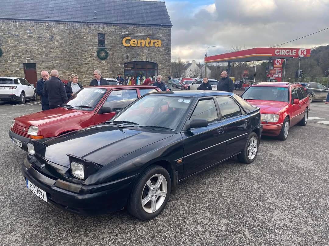 A few of the cars on the vintage run at the pit stop in Bandon.