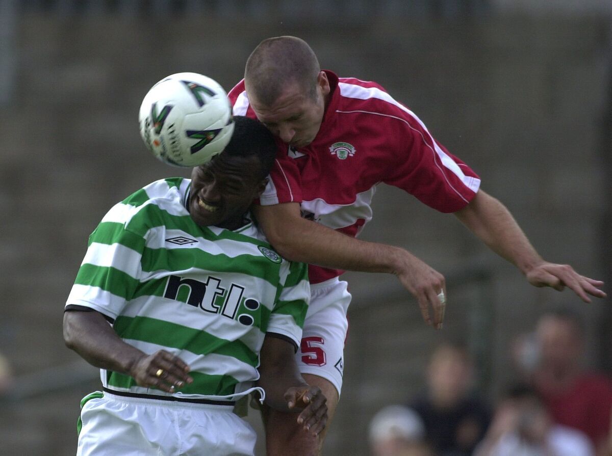 Derek Coughlan and Celtic's Oliver Tebily rise high at Turner's Cross last night. Picture: Eddie O'Hare Derek Coughlan and Celtic's Oliver Tebily rise high at Turner's Cross last night. Picture: Eddie O'Hare