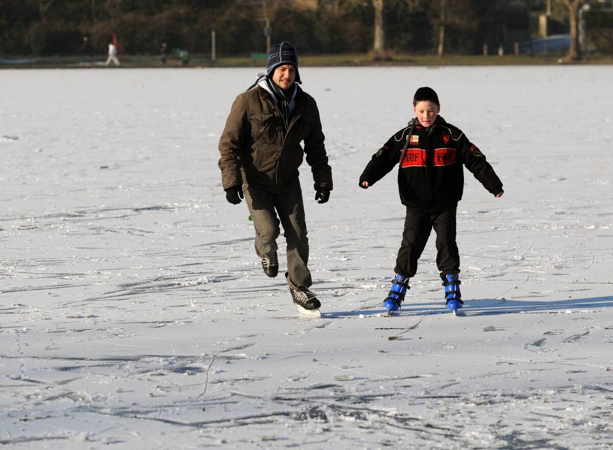 Locals Cian and Tadhg O’Mahony skating on the frozen surface of The Lough during the big freeze of 2010. Picture: Eddie O'Hare Locals Cian and Tadhg O’Mahony skating on the frozen surface of The Lough during the big freeze of 2010. Picture: Eddie O'Hare