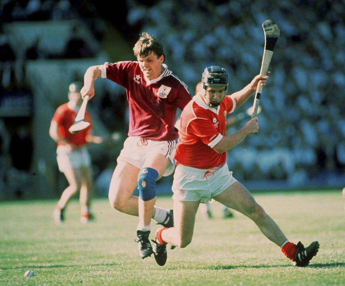 Tony O'Sullivan of Cork in action against Martin Naughton of Galway in 1990. Picture: Ray McManus/Sportsfile