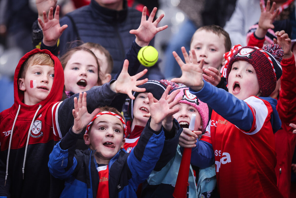 Watergrasshill fans attempt to catch a match sliotar at Croke Park. Picture: INPHO/Tom Maher
