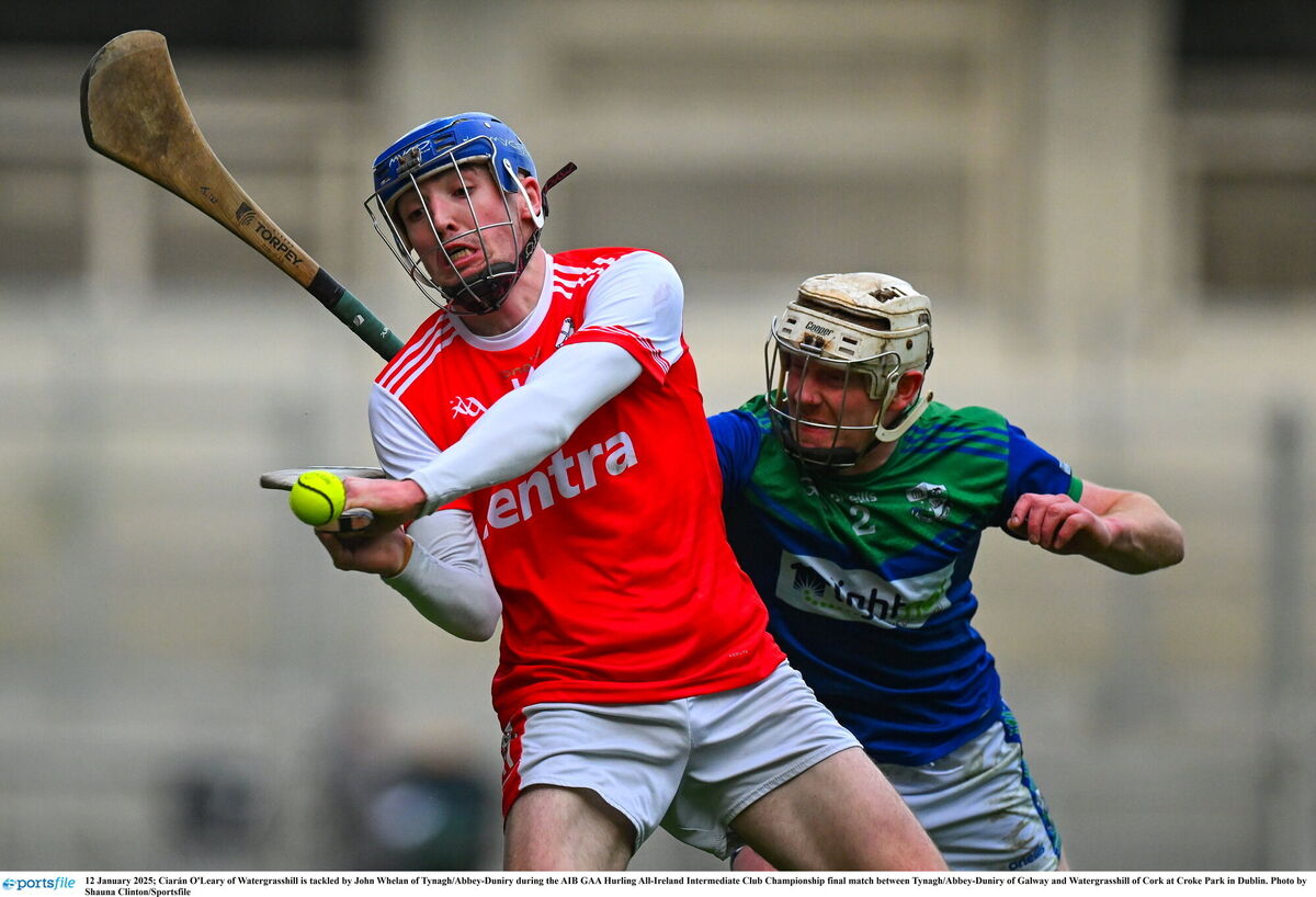 Ciarán O'Leary of Watergrasshill is tackled by John Whelan of Tynagh/Abbey-Duniry. Picture: Shauna Clinton/Sportsfile