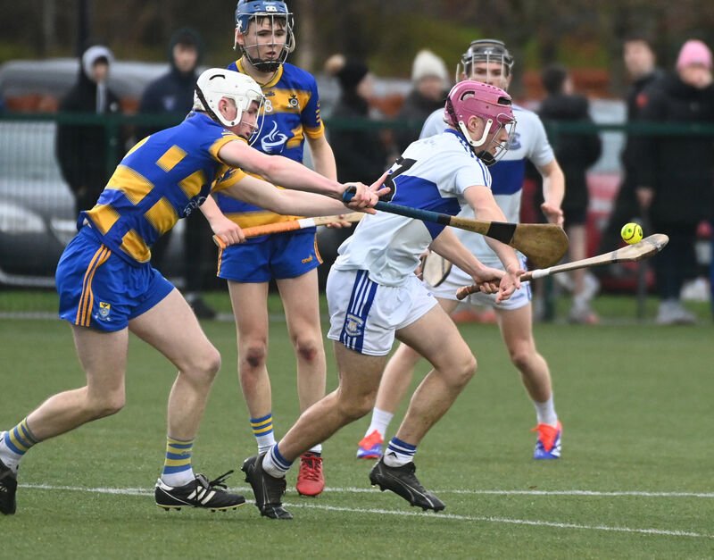  Callum Ó Cofaigh of Gaelcholáiste Mhuire holds possession under pressure from Cashel CS's Noah O'Flynn. Picture: Eddie O'Hare