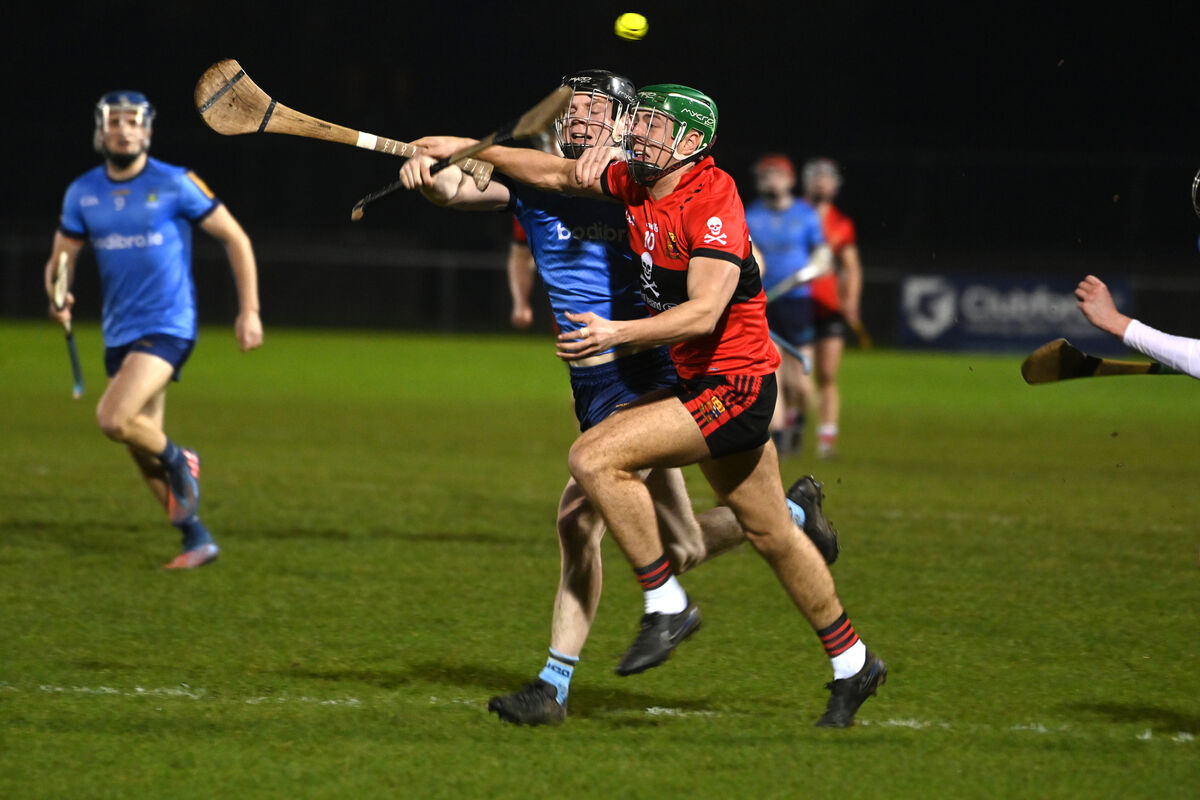  Ben Cunningham of UCC tries to hold off UCD's Peter Connellan. Picture: Larry Cummins 