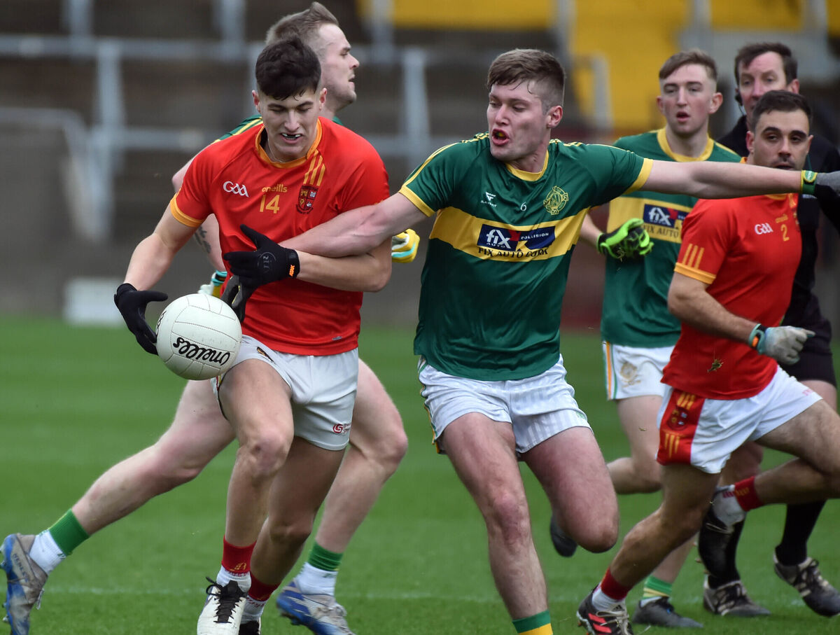 Mallow's Seán McDonnell is tackled by St Michael's Joe Golden during the Cork SAFC final in 2021. Picture: Eddie O'Hare
