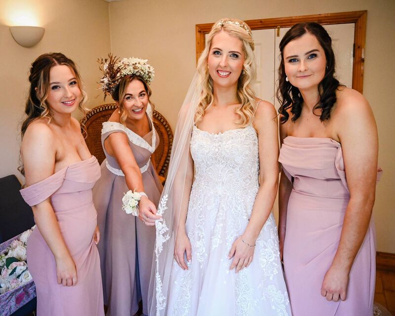 Julie (centre) pictured with her sister Abi, her mum Jennifer, and her sister Amy. Julie (centre) pictured with her sister Abi, her mum Jennifer, and her sister Amy.