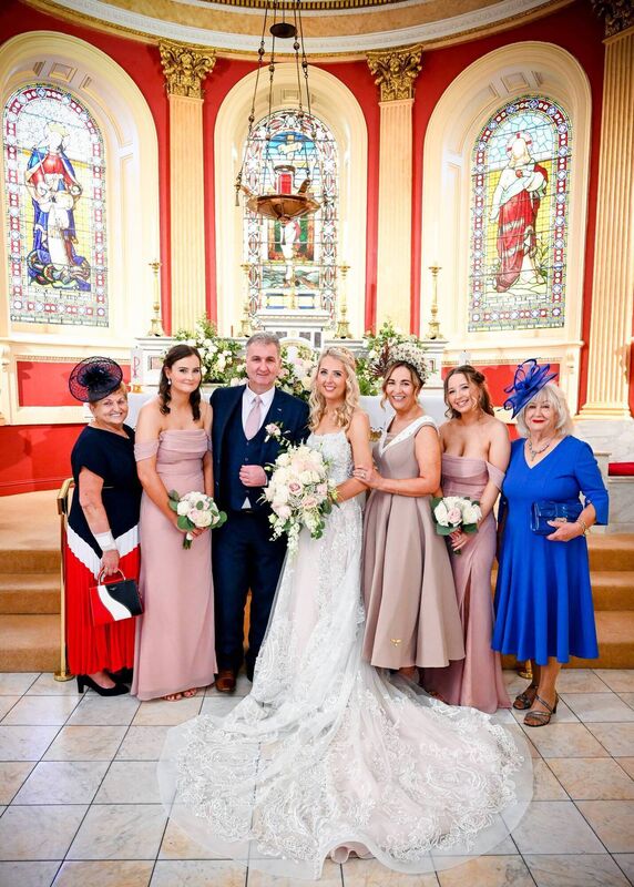 From left: Julie's Nana Antone, Amy Curtin, father-of-the-bride Trevor, Julie Matthews, mother-of-the-bride Jennifer, Abi Curtin and Julie's grandmother Marie O'Connell. From left: Julie's Nana Antone, Amy Curtin, father-of-the-bride Trevor, Julie Matthews, mother-of-the-bride Jennifer, Abi Curtin and Julie's grandmother Marie O'Connell.