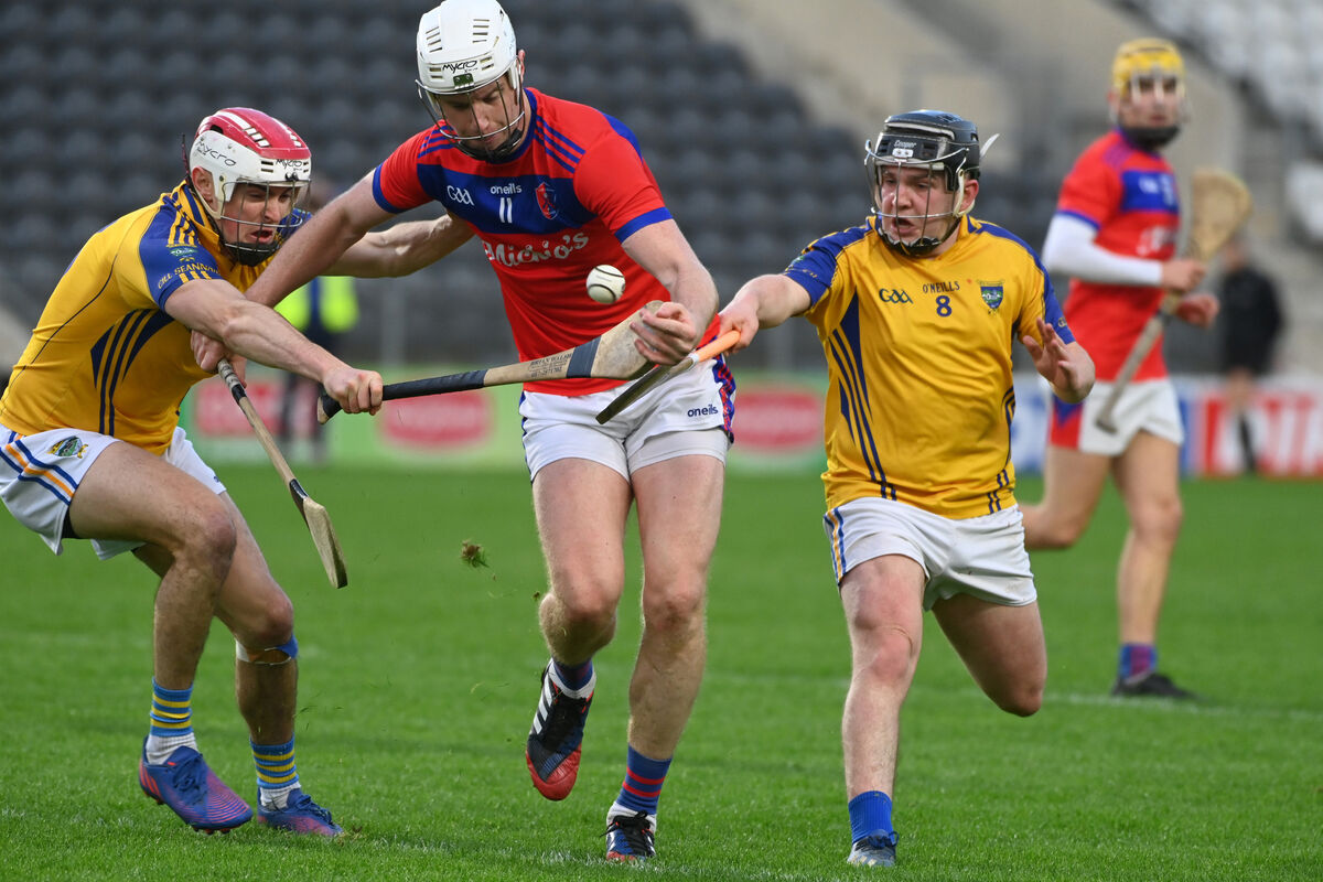 Mark Collins of Erin's Own is tackled by Kilshannig's Brian Guerin and Conor Murphy in 2022. Picture: Eddie O'Hare Mark Collins of Erin's Own is tackled by Kilshannig's Brian Guerin and Conor Murphy in 2022. Picture: Eddie O'Hare