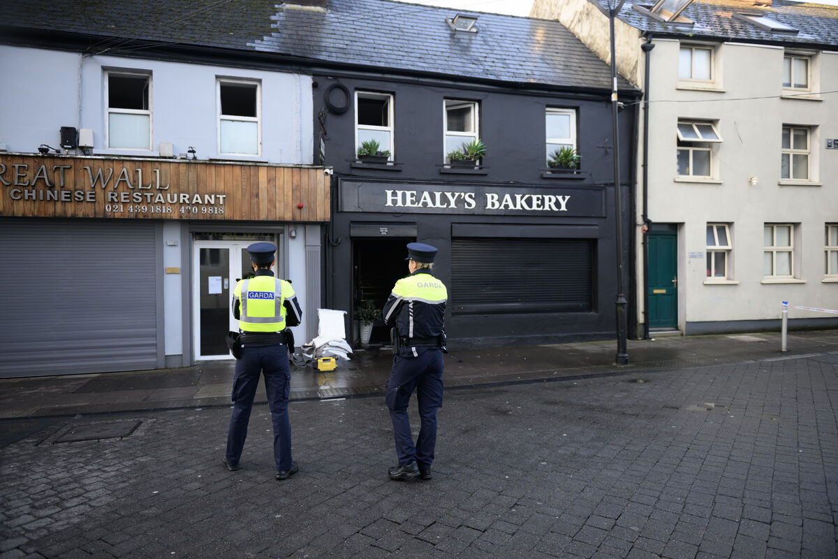 Gardaí on duty outside Healy's Bakery on Great William O'Brien Street, Cork which was damaged by fire in the early hours of Wednesday morning. Picture Dan Linehan Gardaí on duty outside Healy's Bakery on Great William O'Brien Street, Cork which was damaged by fire in the early hours of Wednesday morning. Picture Dan Linehan