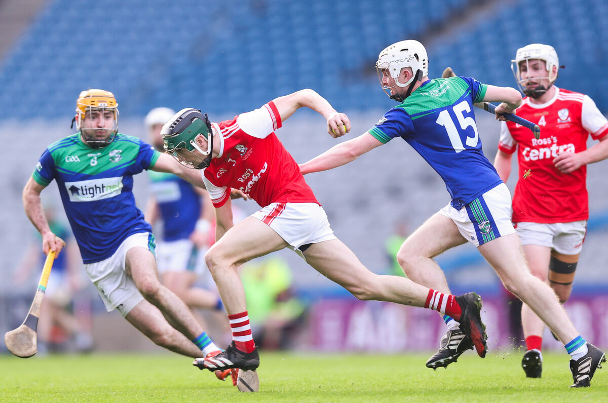 Watergrasshill's Dylan McCarthy is challenged by Johnny Conroy and John Dervan of Tynagh/Abbey-Duniry. Picture: INPHO/Tom Maher