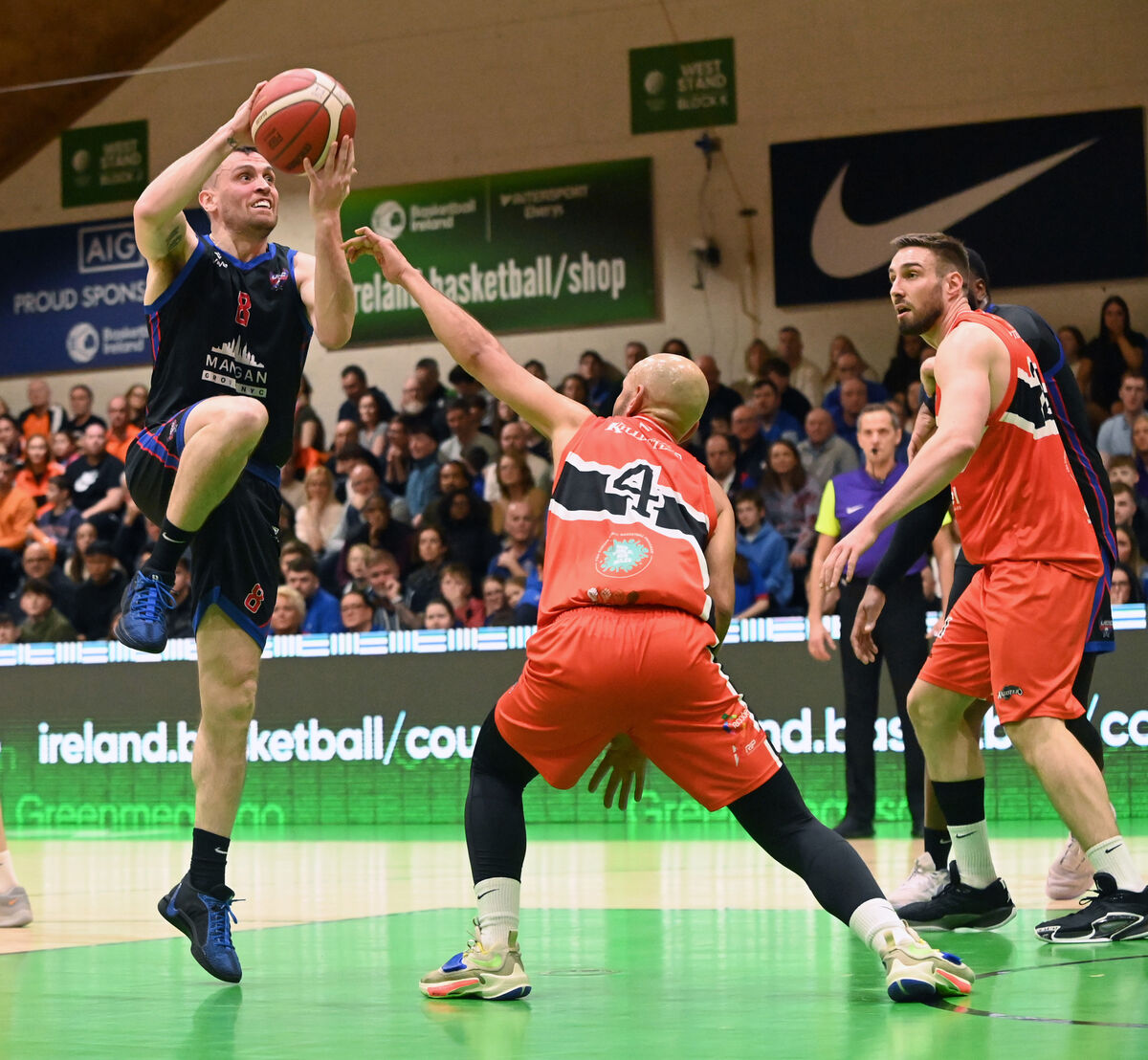 UCC Demons' Kyle Hosford lays up a basket from Killester's Isaac Westbrooks during the Pat Duffy national cup final at the National Basketball Arena, Tallaght. Picture: Eddie O'Hare