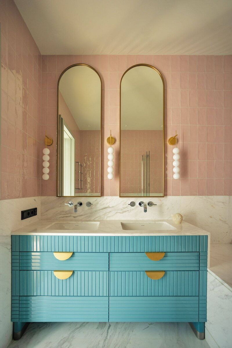 A stylish contemporary bathroom pairs a pastel backsplash with a boldly coloured statement vanity unit; illustrating the Colourful Bathroom Suites trend. Picture: O&A Design/Anna Aapova & Aleg Klodt/Roman Pandra Tov.Ru/PA. A stylish contemporary bathroom pairs a pastel backsplash with a boldly coloured statement vanity unit; illustrating the Colourful Bathroom Suites trend. Picture: O&A Design/Anna Aapova & Aleg Klodt/Roman Pandra Tov.Ru/PA.