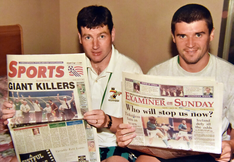 Corkmen Roy Keane and Denis Irwin catch up with a special Sunday edition of the Examiner during the world cup of 1994