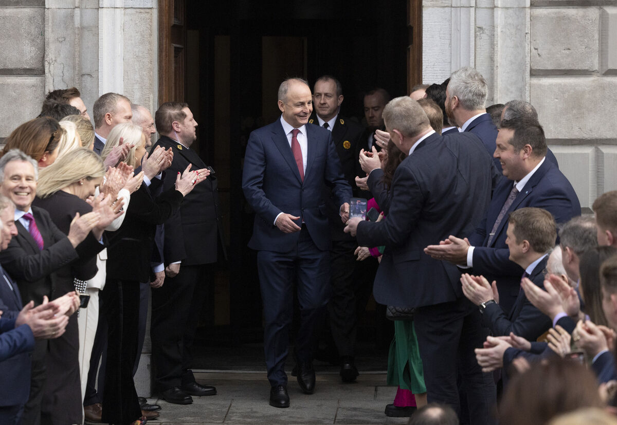 An Taoiseach Micheál Martin with party colleagues from Fianna Fáil at Leinster House after the vote confirming him as Taoiseach. An Taoiseach Micheál Martin with party colleagues from Fianna Fáil at Leinster House after the vote confirming him as Taoiseach.