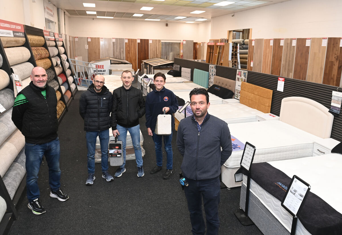 Ben Warrilow with staff in the showroom at Factory Carpet Superstores. Ben Warrilow with staff in the showroom at Factory Carpet Superstores.