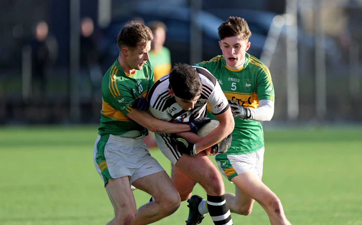 Kilmurry's Rory Duggan and Seán O'Leary put the pressure on Jake Brosnan of St Nick's during the County U21 B FC final last year. Picture: Jim Coughlan