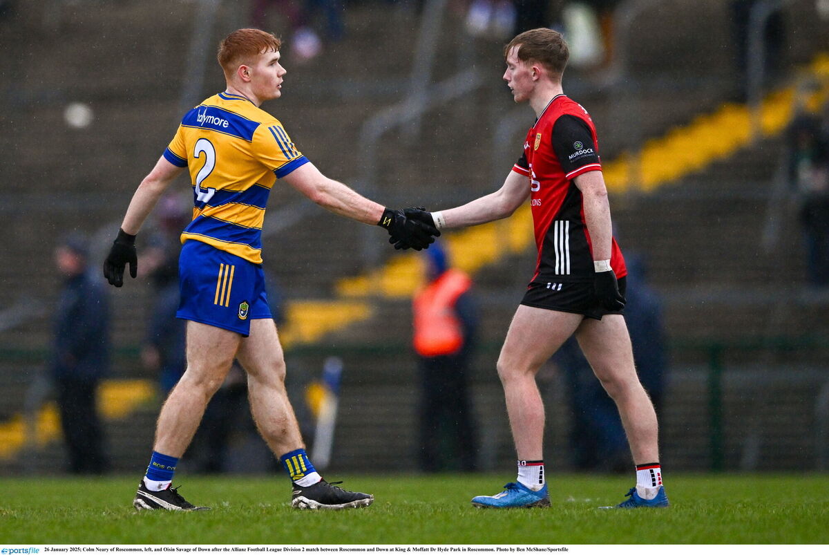 Colm Neary of Roscommon, left, and Oisin Savage of Down after the Allianz Football League Division 2 match between Roscommon and Down at King &amp; Moffatt Dr Hyde Park in Roscommon. Picture: Ben McShane/Sportsfile