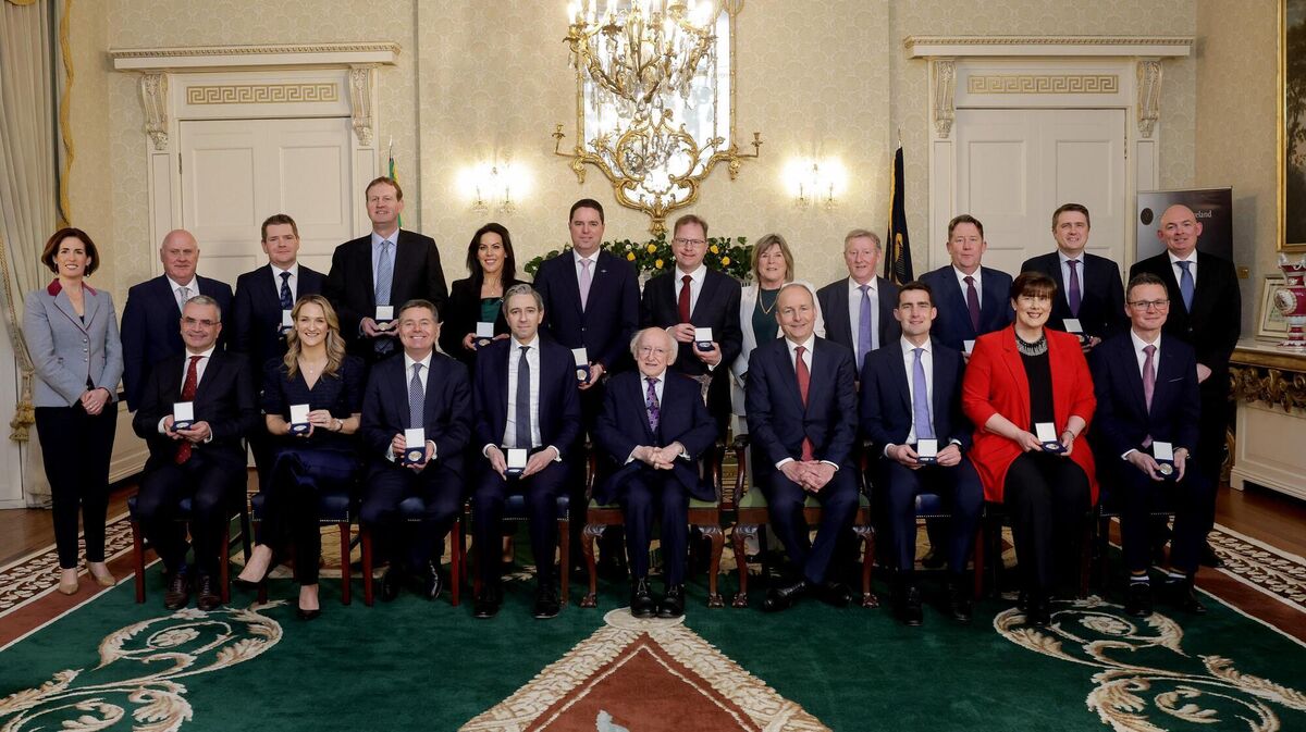 President Higgins, Taoiseach Micheal Martin, Tánaiste Simon Harris along with the new Cabinet for a photo after the new Ministers received their Seal of Office at a ceremony held in Áras an Uachtaráin. Picture: Maxwell’s President Higgins, Taoiseach Micheal Martin, Tánaiste Simon Harris along with the new Cabinet for a photo after the new Ministers received their Seal of Office at a ceremony held in Áras an Uachtaráin. Picture: Maxwell’s
