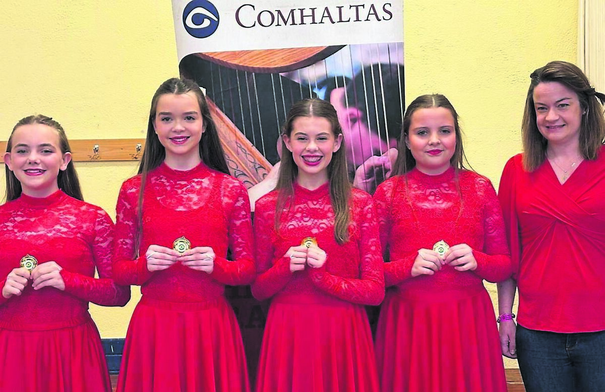 Keelin O’Rourke, Muireann O’Mahony, Jessica Callanan, and Lucy Thornhill: members of the Niamh Hatchell School of Dance representing Douglas Comhaltas who became county champions in the 11-14 age group four-hand céilí at last weekend’s Ceol an Gheimhridh competition held at Macroom. Their dance teacher, Niamh Hatchell, is on right.
