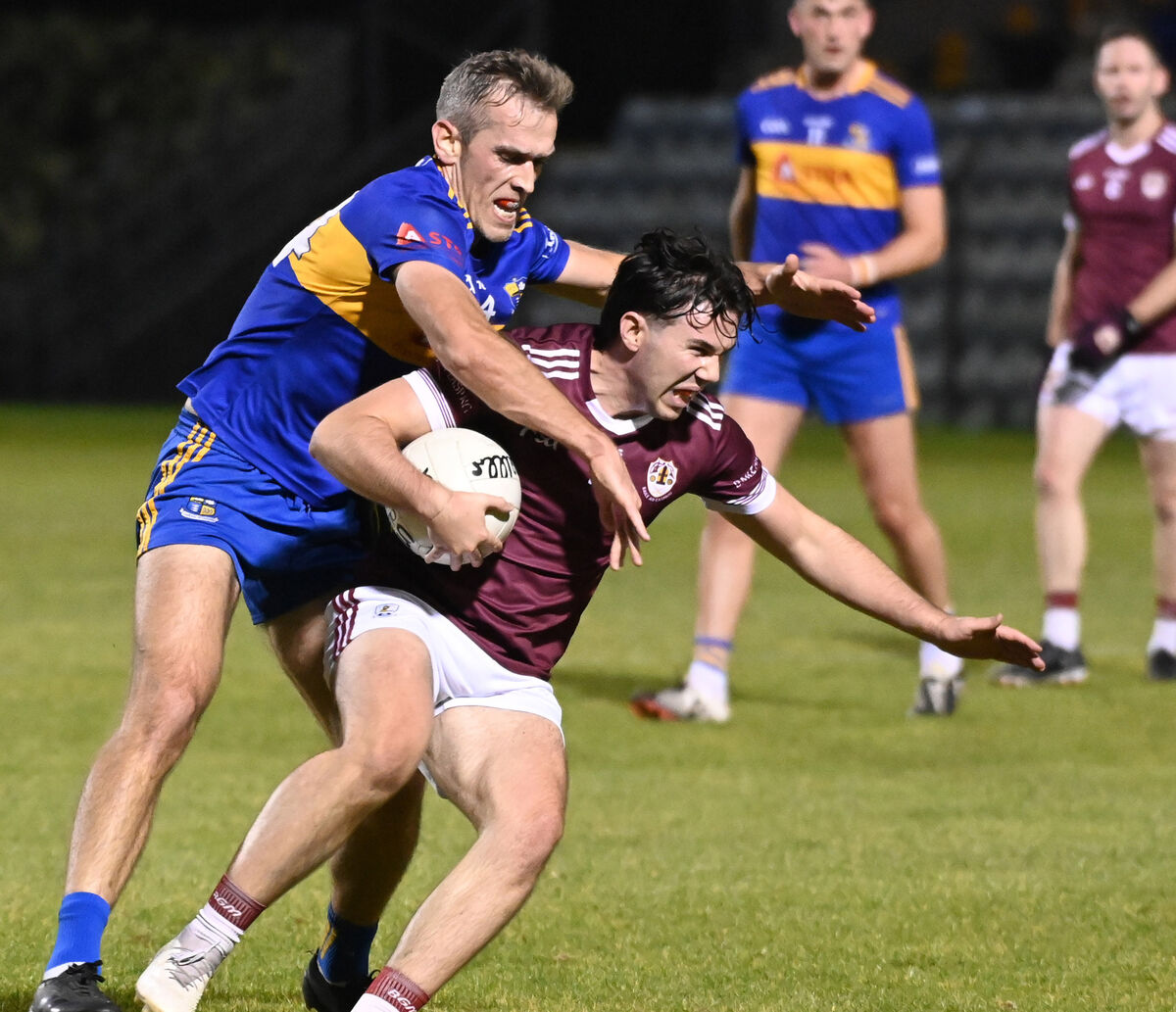 Bishopstown's Nathan Gough is tackled by Carrigaline's Niall Coakley last season. Picture: Eddie O'Hare