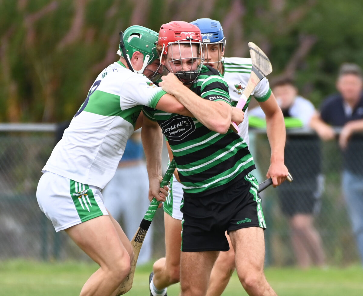 Kanturk's Brian O'Sullivan (pictured tackling Brian O'Neill) played well in midfield and scored a point from play. Picture: Eddie O'Hare