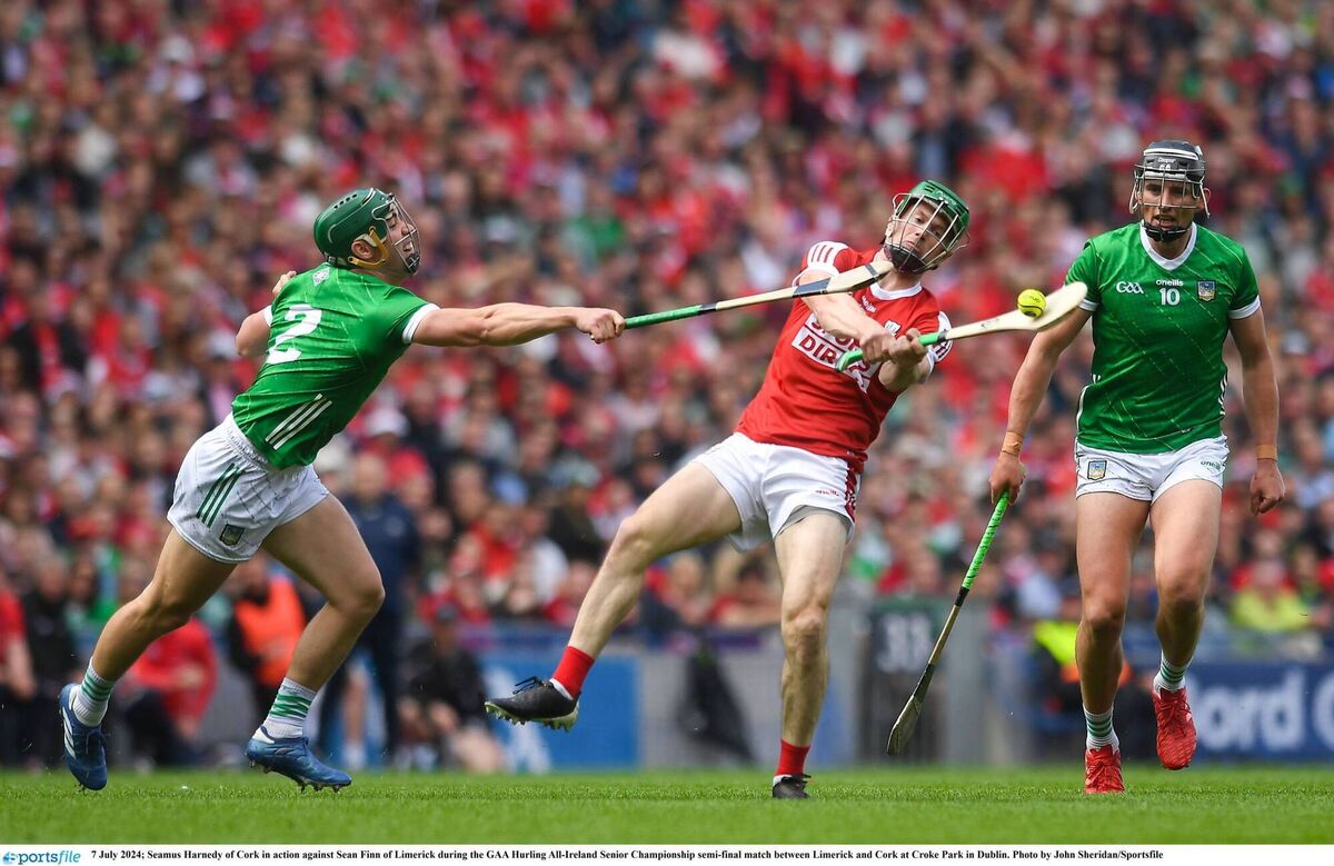 Cork's Séamus Harnedy gets his shot away as Seán Finn of Limerick closes in during last year's All-Ireland SHC semi-final at Croke Park. Picture: John Sheridan/Sportsfile