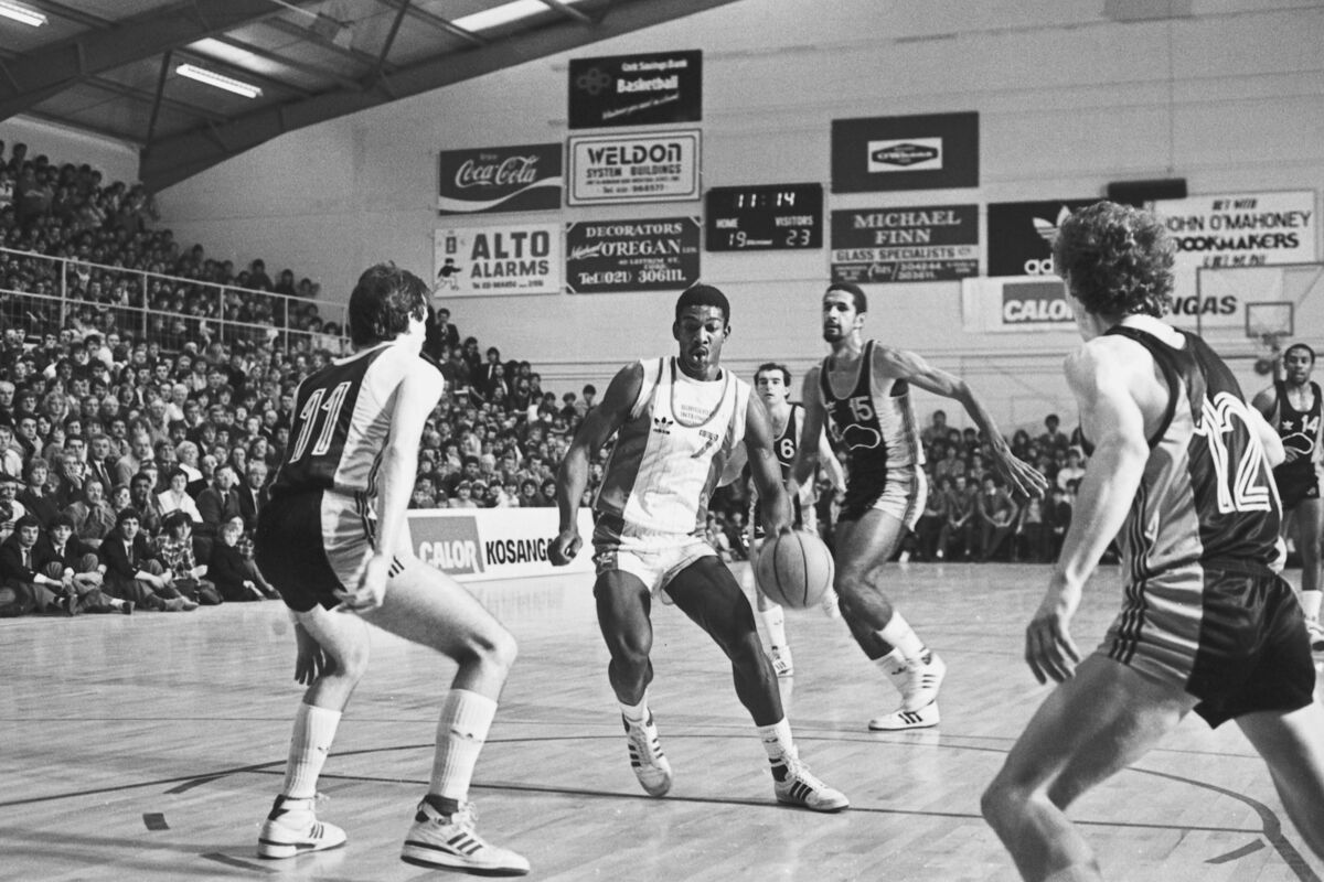 Basketball , Burgerlands Ray Smith trying to get by Tim McCarthy Team Britvic during the national cup final at Neptune Stadium on 20/01/85