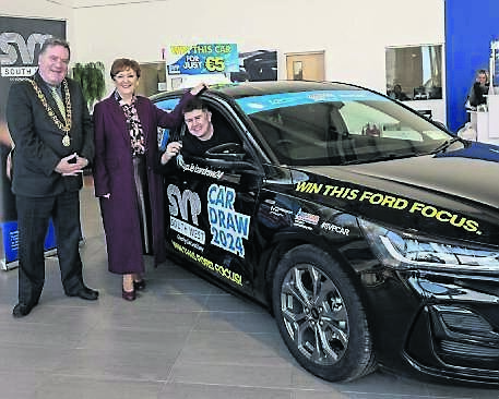 Séan Kennedy Jr from Carrigaline, winner of a Ford Focus in the annual SVP car draw, with the Lord Mayor of Cork, councillor Dan Boyle and SVP south west regional president, Frances Behan.	Picture: Brian Lougheed
                    