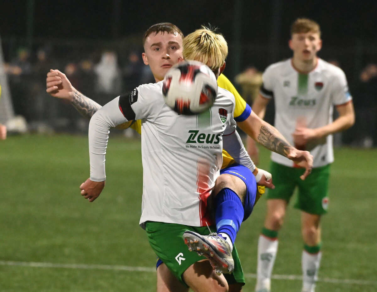 EYES ON THE BALL: Carrigaline United's Andrew Cronin tackles Cork City's Patryk Swieczka Andrzejczak. Picture: Eddie O'Hare