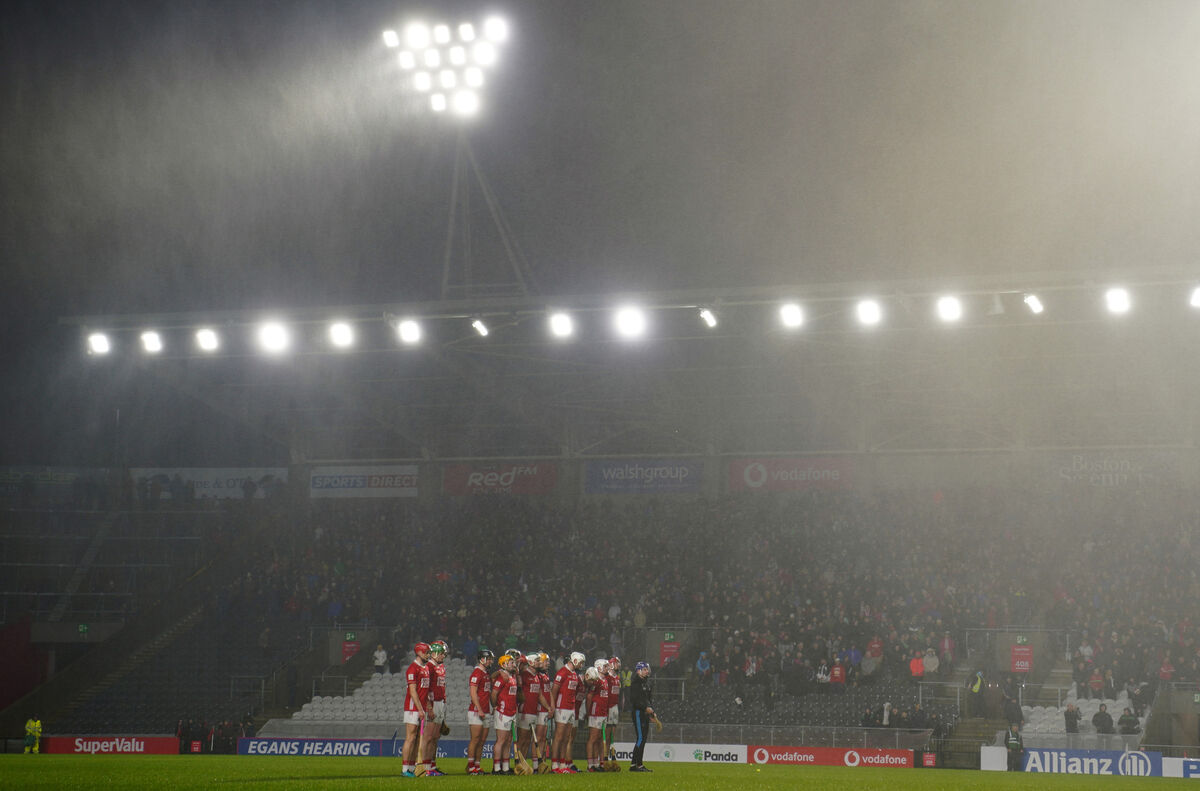 The Cork team stand for the national anthem before the game. Picture: Inpho/James Lawlor