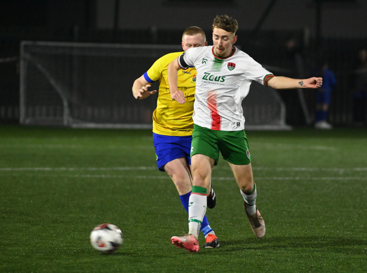 Cork City's Rhys Kelly-Noonan knocks the ball away from Carrigaline United's Cian Kingston. Picture: Eddie O'Hare