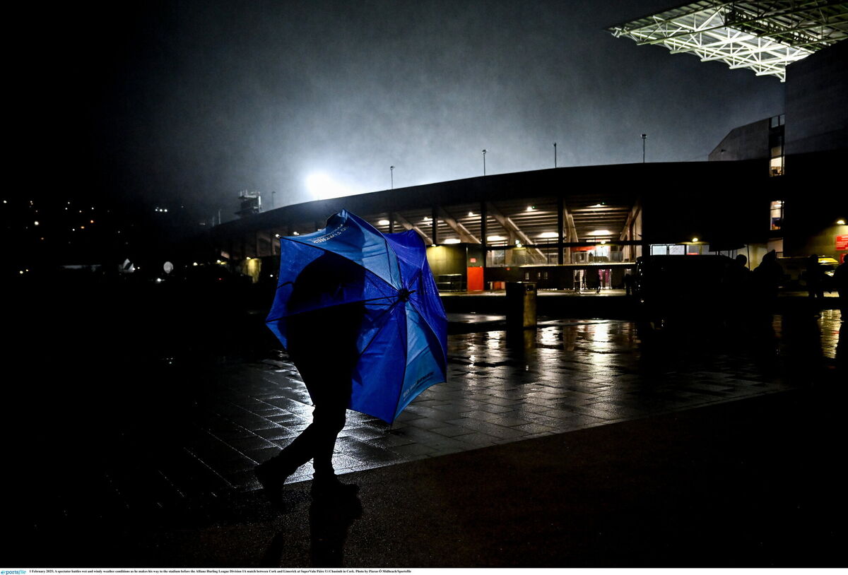 A spectator battles wet and windy weather conditions as he makes his way to the stadium. Picture: Piaras Ó Mídheach/Sportsfile A spectator battles wet and windy weather conditions as he makes his way to the stadium. Picture: Piaras Ó Mídheach/Sportsfile