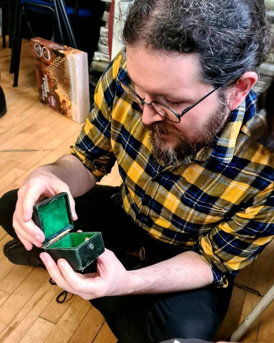 Alan fixing an antique jewellery box.